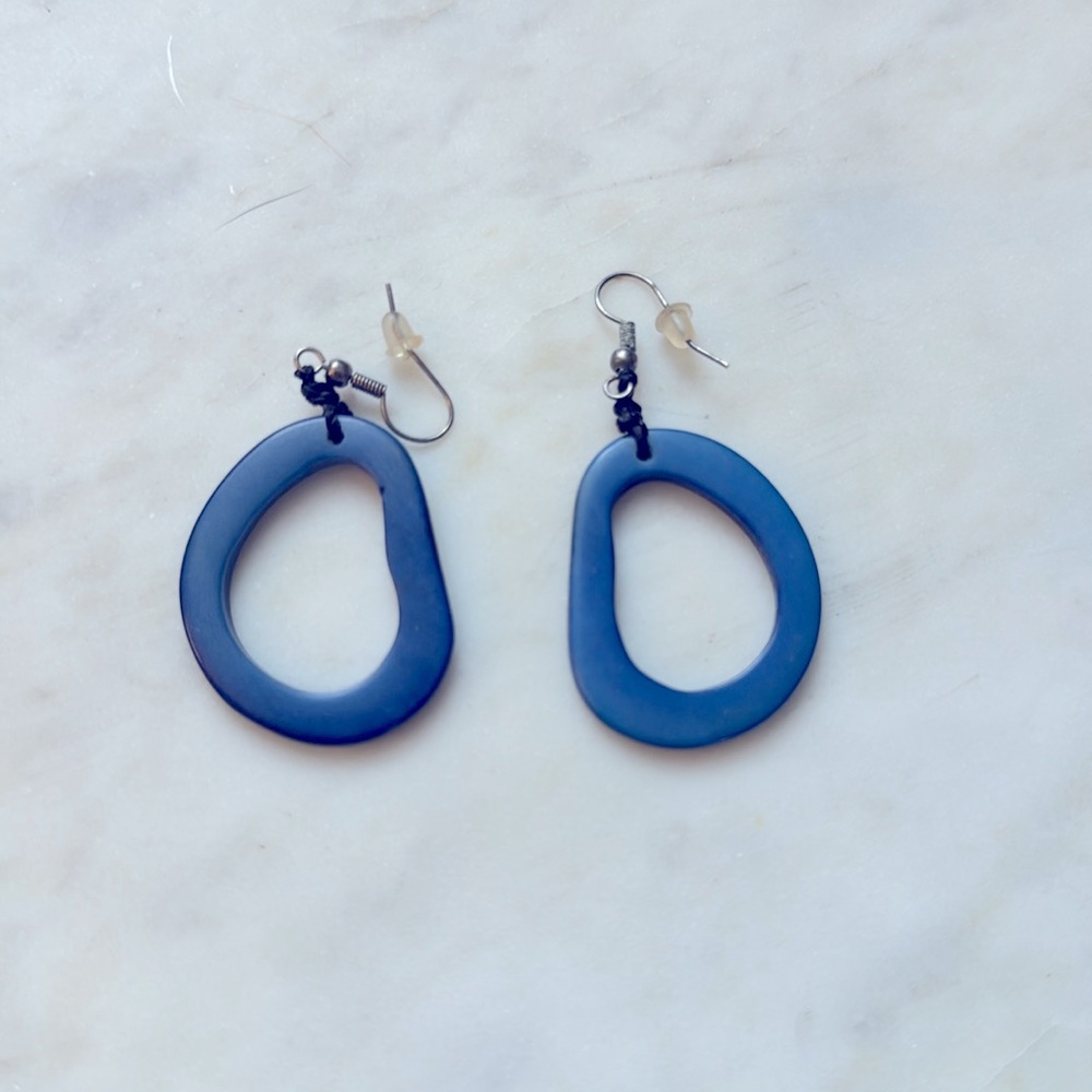 Blue geometrical hoop earrings.